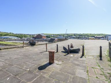 An outdoor area with a pier and an anchor at Keekle Terrace in Cleator Moor