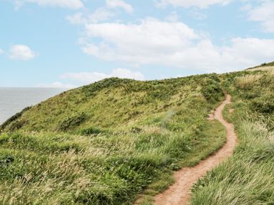 A path along a hill overlooking the sea at Puffin in St Bees
