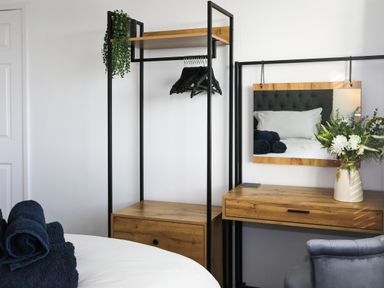 A bedroom with a bed and furnishings at Penrhos Walks in Holyhead