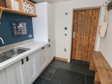 A kitchen with a sink and countertop at The Barn in Newport