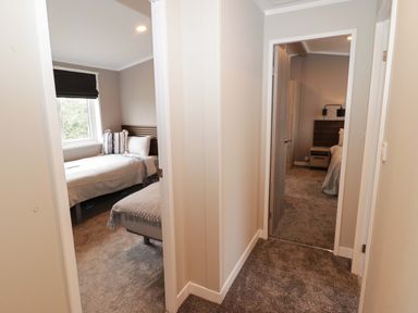 A hallway leading to bedrooms at Dolphin in Haverfordwest