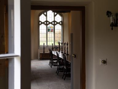 A dining room with a table and chairs at West Cottage Myddfai near Llandovery