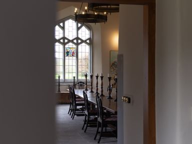 A dining room with a table and chairs at West Cottage Myddfai near Llandovery