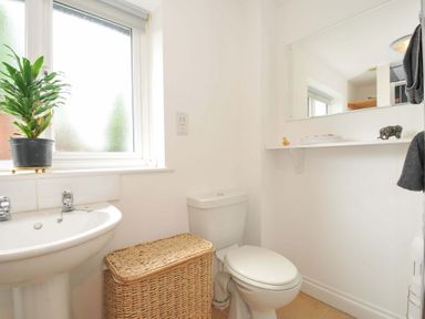 A bathroom with a sink and toilet at Upper Court Cottage Broad Langdon near Wainhouse Corner