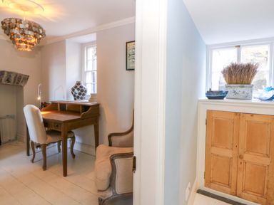 An office with a desk and chair at Zenobia in New Quay