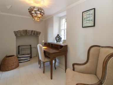 An office with a desk and chair at Zenobia in New Quay