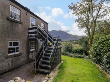 An outdoor view of stairs leading to a building at Buckbarrow in Seascale