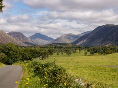 A landscape with mountains and a road at Buckbarrow in Seascale
