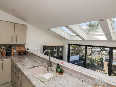 A kitchen with cabinets and a sink at 36 Crowthers Hill in Dartmouth