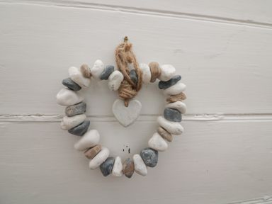 A heart-shaped decoration made of stones and twine at 36 Crowthers Hill in Dartmouth