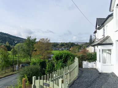 A view of a road and trees at Haulfryn in Dolwyddelan