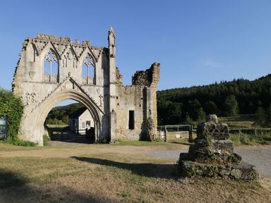Building ruins with an archway and trees at 2 Jade side, Malton