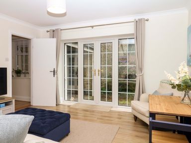 A living room with a sofa and coffee table at 2 Sheplegh Court Blackawton near Dartmouth