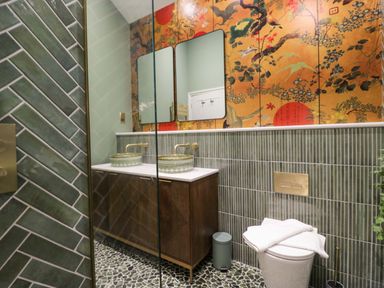 A bathroom with a sink and toilet at The Studio in Windermere