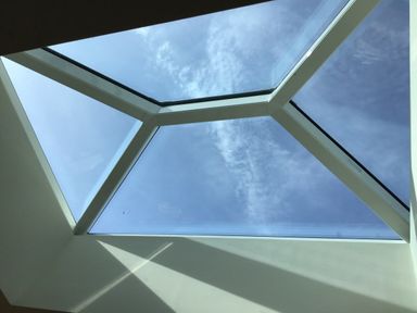 A skylight with clouds visible at Sea Folly in Porthcawl