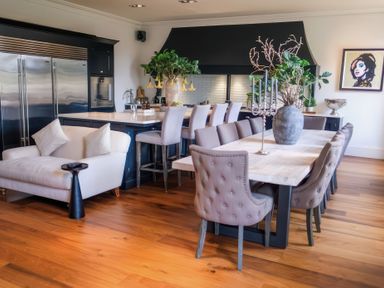 A dining room with a table and chairs at St Anne's Manor in Torquay