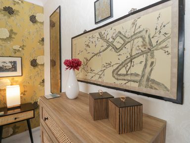 A hallway with wall art and decorative items at Apple Byrd in Kendal