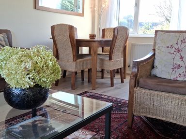 A dining room with a table and chairs at Apple Byrd in Kendal