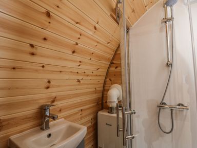 A bathroom with a sink and shower at Oak View Rhayader