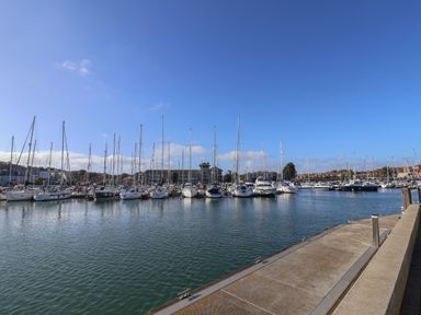 A marina with boats and yachts at Harbour Heights in Weymouth