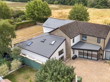 An aerial view of a house with a garden at Manor Farm House in Merton near Bicester