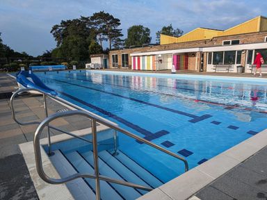 An outdoor swimming pool with slides at Hotchkin Lodge in Woodhall Spa