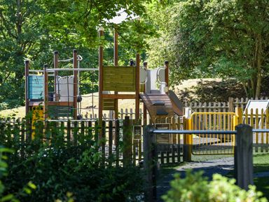 A playground with a climbing frame and slide at Askrigg Aysgarth