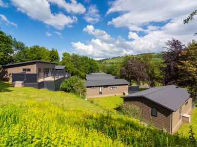 A view of modern houses on a hillside at Askrigg Aysgarth