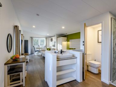 A living room with a sink and toilet at Somersby (Pet) in Louth