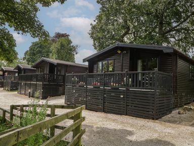 Log cabins with porches in a natural setting at Watendlath, Keswick
