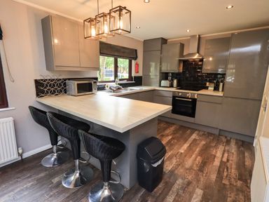 A kitchen with modern design and appliances at Costapacket, Grasmere 12, White Cross Bay near Windermere