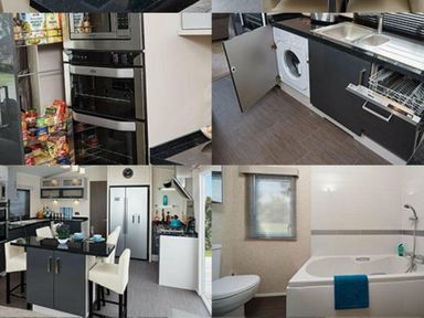 a kitchen with appliances and a dining area at Ocean Edge Leisure Park - Holiday Accommodation 1317 in Heysham