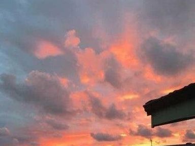 a sunset with colorful clouds in the sky at Ocean Edge Leisure Park - Holiday Accommodation 1317, Heysham