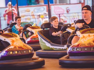 children driving bumper cars at Unity Holiday Resort - Holiday Accommodation 15970 in Brean Sands