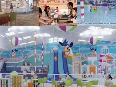 an indoor water park with slides and seating areas at Hafan y Mor Haven - Holiday Accommodation 16279, Pwllheli