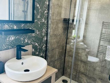 a bathroom with a shower and sink at Ashbourne Heights Holiday Park - Holiday Accommodation 18103 in Ashbourne