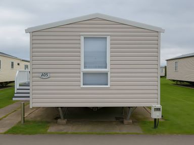 A static caravan with a window at Whitehouse Leisure Park - Holiday Accommodation 19055 Towyn, Abergele
