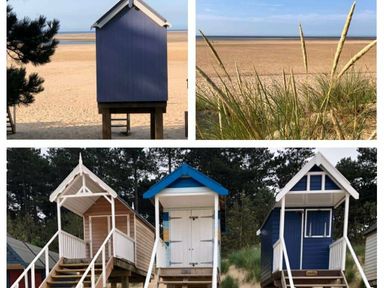 beach huts by the sea and sandy beach at Pinewoods Holiday Park - Holiday Accommodation 19734, Wells-Next-The-Sea