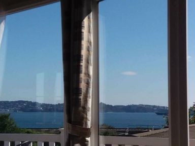 a view of water and land through a window with curtains at Waterside, Paignton - Holiday Accommodation 2287, Paignton