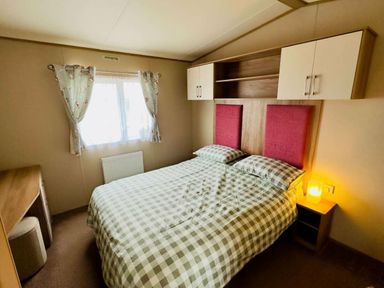a bedroom with a double bed and window at St Andrews Holiday Park - Holiday Accommodation 609 St. Andrews