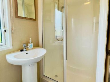 a bathroom with a shower and sink at St Andrews Holiday Park - Holiday Accommodation 609, St. Andrews