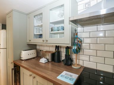 A kitchen with cabinets and appliances at 58A South Ford Road Dartmouth