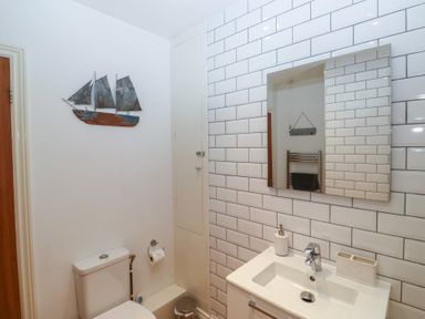 A bathroom with a sink and toilet at 58A South Ford Road Dartmouth
