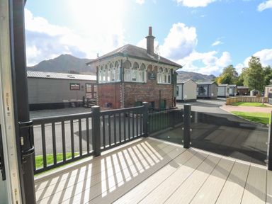 A view of a lodge from a balcony at Altair Lodge 