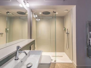 A bathroom with a shower, sink, and toilet at The Weir in North Berwick