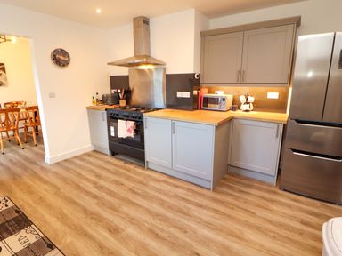 A kitchen with modern appliances at Westerlodge in Threlkeld near Keswick