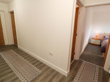 A hallway leading to a bedroom at Westerlodge Threlkeld near Keswick