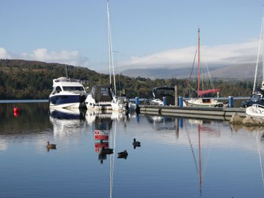 A marina with boats docked at 7 Lake View in Windermere