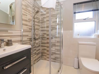 A bathroom with shower, toilet and sink at 7 Lake View, Lake View 7, White Cross Bay near Windermere