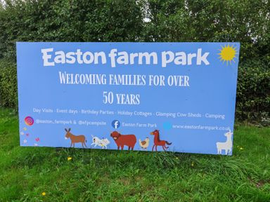 A banner for Easton Farm Park welcoming families for over 50 years